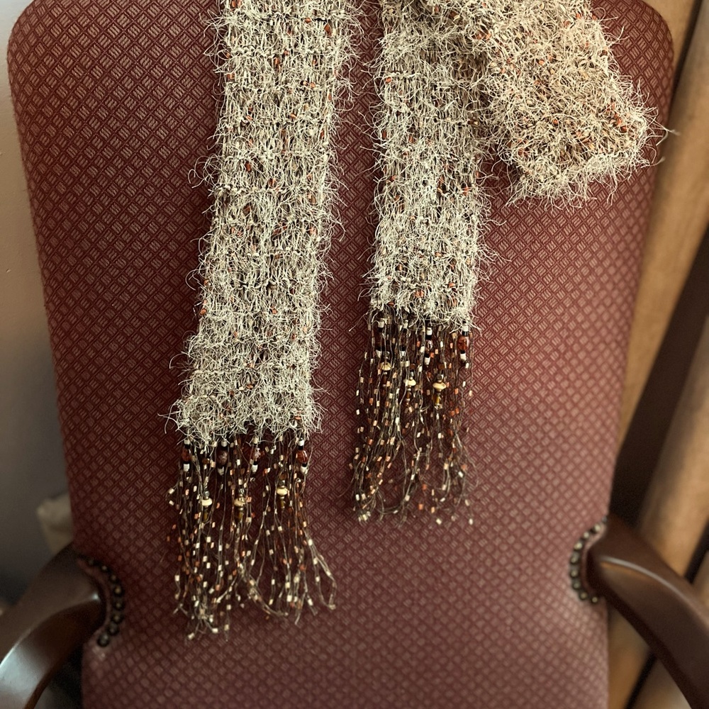 Hand made scarf. End fringe has beads